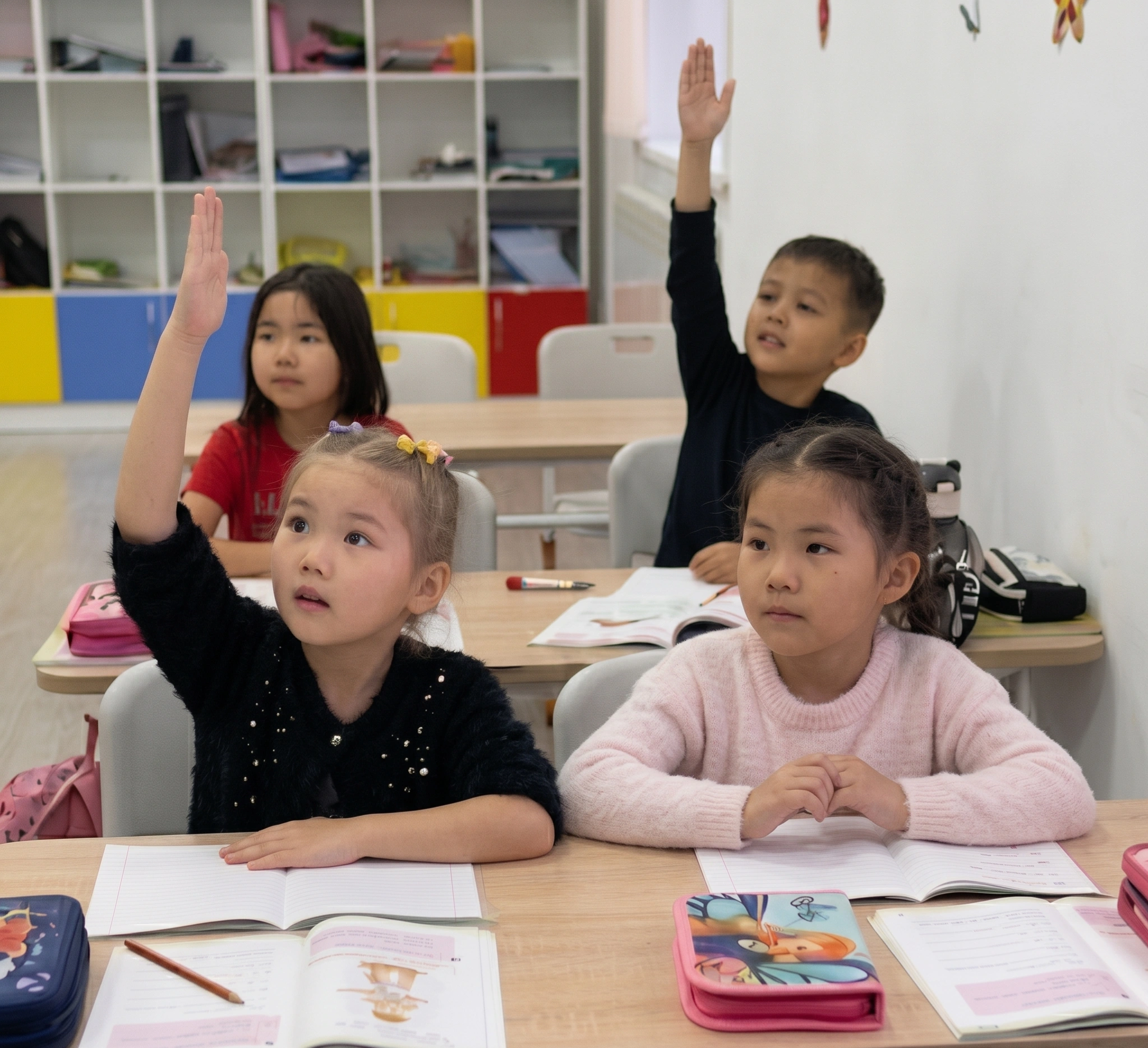 Perspective elementary school students at their desks in a classroom